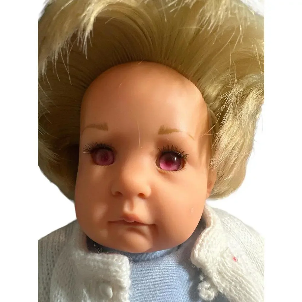 This Gotz doll is a beautiful vintage toddler baby with blonde straight hair and